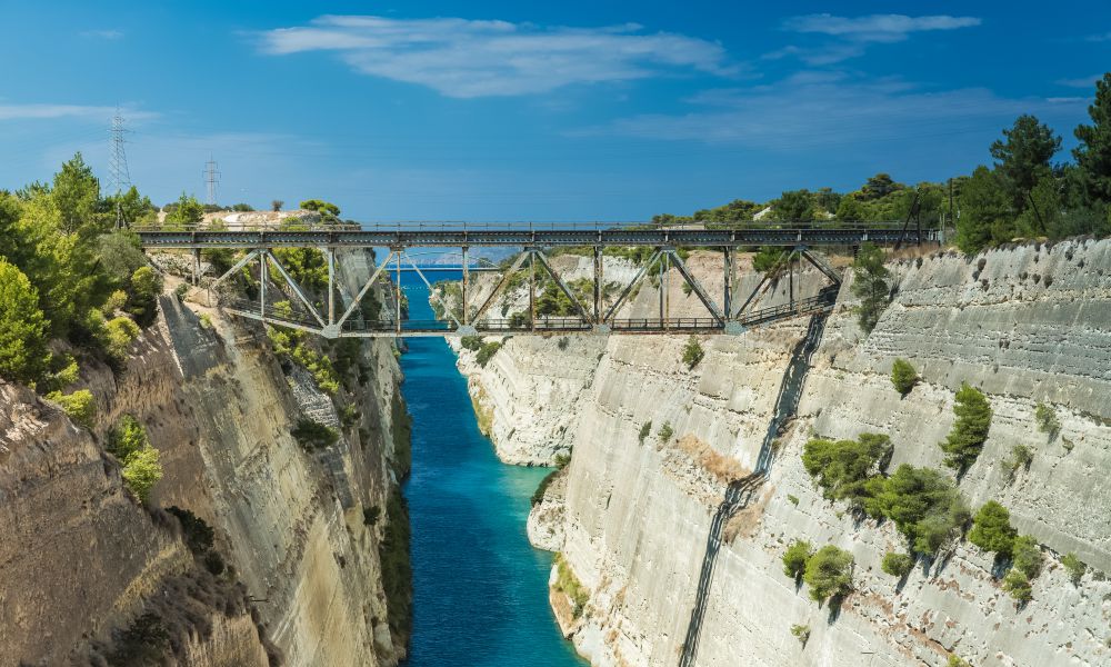 8. Zulu Bungy Jump
If you're more the adventurous type, then I definitely recommend checking out the Zulu Bungy Jump. This is one of the most daring things to do in Corinth, and it is also one of the popular attractions.
This extreme bungee jump is 70 meters above the Corinth Canal. To try this jump, you will have to put yourself in the hands of the professionals. Full safety equipment, including a harness, a helmet, and a bungee cord, are provided for this experience. There is a small training session before the jump to ensure that you're comfortable and that everything goes off without a hitch.
The jump itself is truly exhilarating. You'll feel like you're flying as you soar through the sky, putting your trust in a bungee cord for safety. You can choose a standard or Zulu package which is two jumps on the same day.  Either way, it's an experience you will never forget.
And if you think this sounds too scary, you're not alone. I'll admit, it can be a little frantic, so people who suffer from fear of heights might not want to partake. But if you are the daring type, then this is something you have to check out. It is definitely one of the top attractions in Corinth you won't want to miss.
